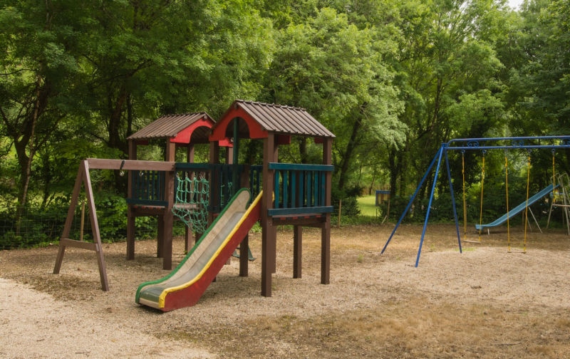 childrens play area, slide, swings